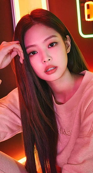 Jennie Kim in Pink Sweatshirt with Neon Lighting and Long Dark Hair HD phone wallpaper