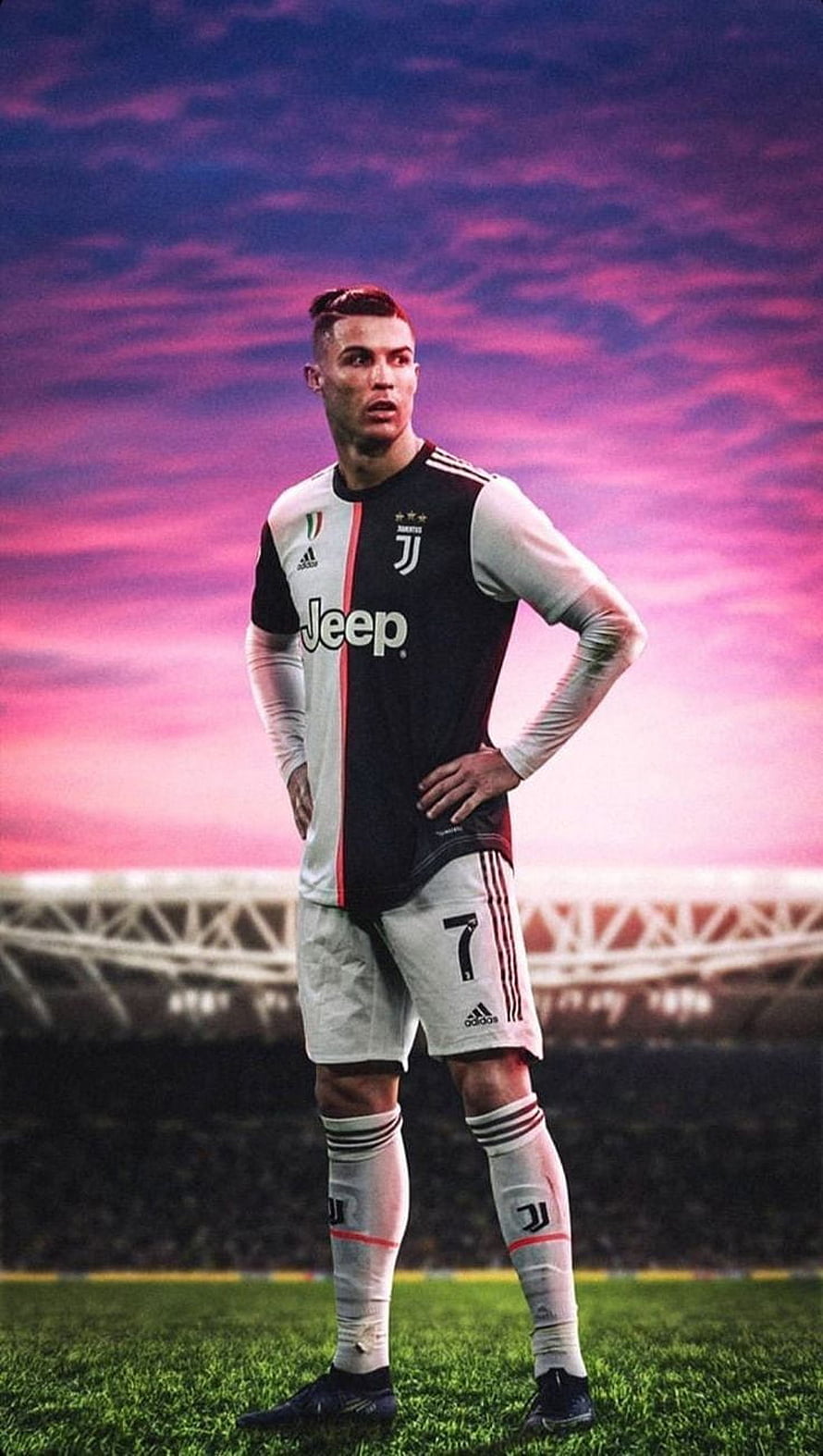 Cristiano Ronaldo in Juventus Kit Standing on the Pitch Under a Vibrant Pink Sky HD phone wallpaper