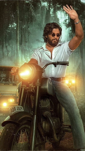 Alluri Sitarama Raju riding a vintage motorcycle in a forest setting from the movie RRR HD phone wallpaper