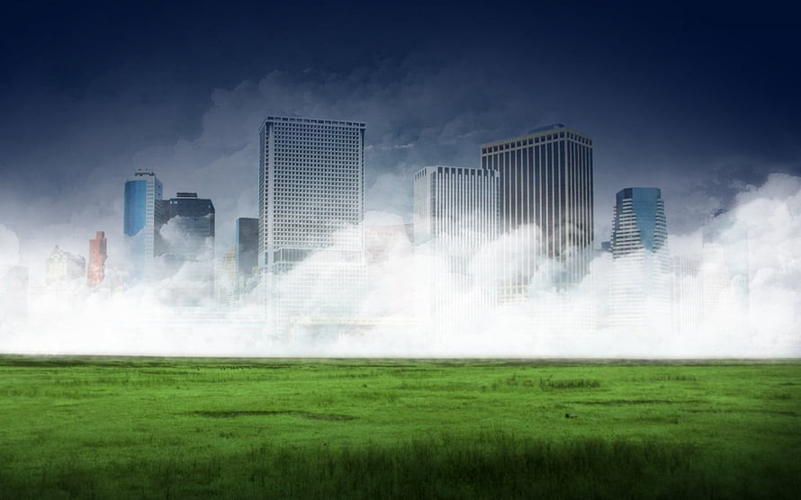 Futuristic City Skyline Emerging From Thick Fog Over Green Grass Field HD wallpaper
