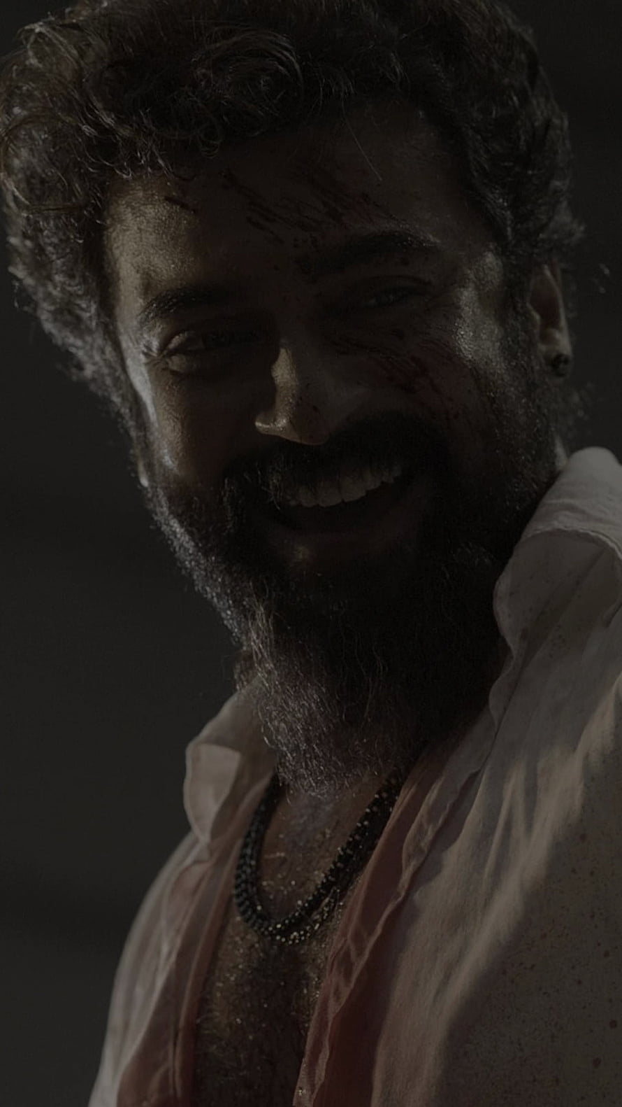 Vikram Intense Portrait with Blood-Stained Face and Bearded Smile HD phone wallpaper