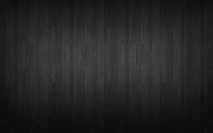 Dark Charcoal Wood Plank Texture Background with Subtle Grain Pattern HD wallpaper