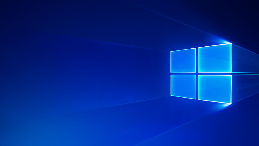 Glowing Windows 10 Logo on Deep Blue Gradient Background HD wallpaper
