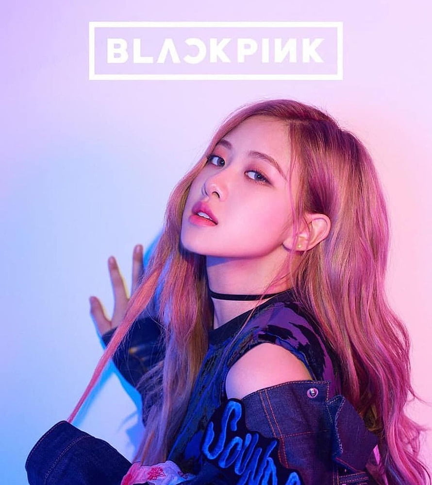 Rosé from Blackpink in a stylish denim jacket with pink and blue lighting HD phone wallpaper