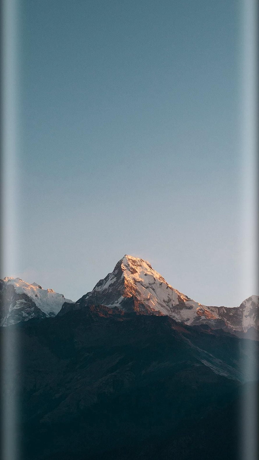 Majestic Snow-Capped Mountain Peak at Sunrise with Golden Hour Light HD phone wallpaper