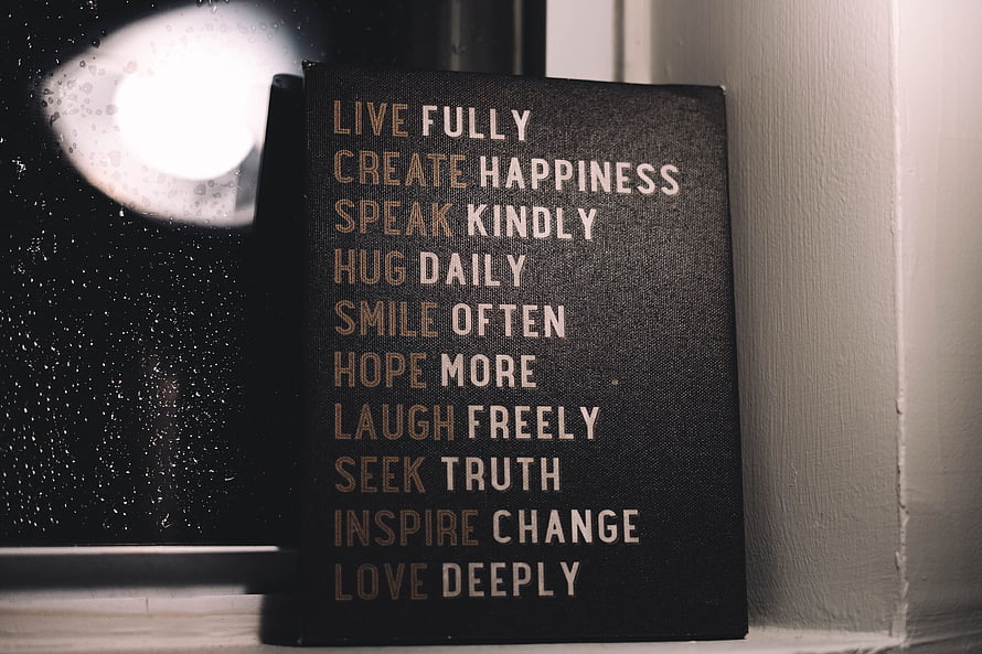 Inspirational Life Motto Journal on a Windowsill with Rainy Night Backdrop HD wallpaper