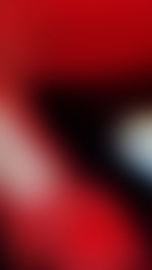 Abstract red and black gradient glow with soft blurred light transitions HD phone wallpaper