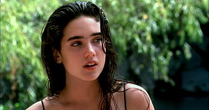 Jennifer Connelly Portrait with Wet Hair in Lush Green Garden Setting HD wallpaper