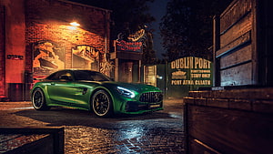 Green Mercedes-AMG GT R Parked on Cobblestone Street at Night in Dublin Port HD wallpaper