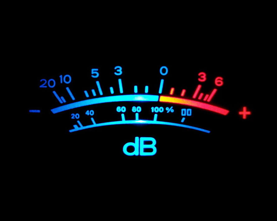 Glowing Decibel Meter Display with Blue and Red Gradient Scale on Black Background HD wallpaper
