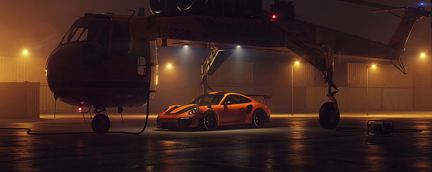 Porsche 911 GT2 RS parked beneath a military helicopter in a foggy hangar at night HD wallpaper