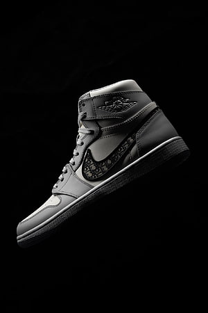 Air Jordan 1 Dior Bred Monogram High-Top Sneaker on Black Background HD phone wallpaper