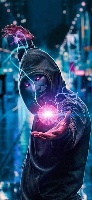 Anonymous Hacker in Hoodie with Glowing Red Eyes and Magic Energy Ball HD phone wallpaper
