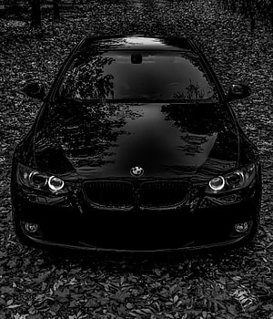 Black BMW E92 Front View in Monochrome Forest Setting HD phone wallpaper