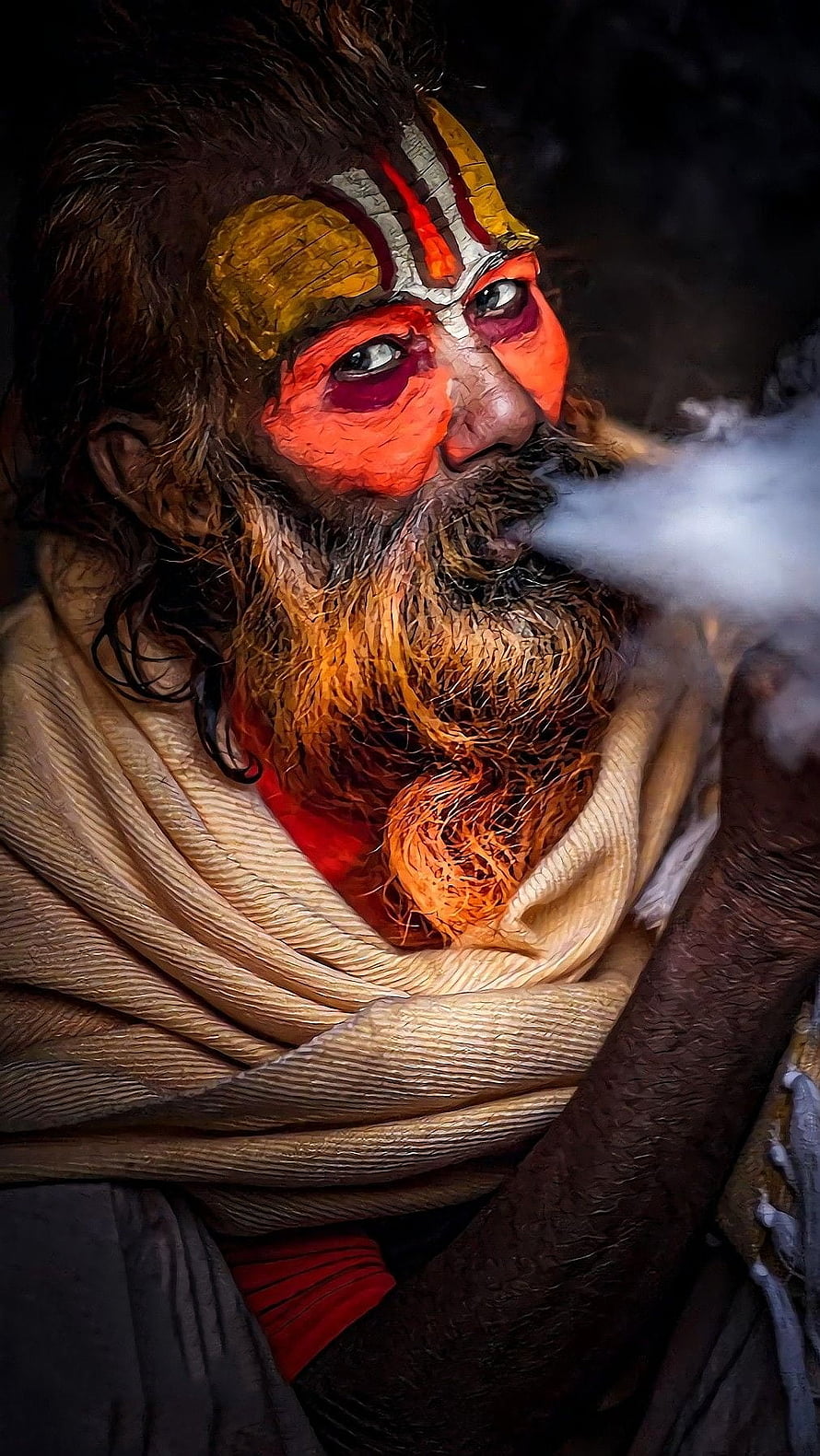 Aghori Sadhu Portrait with Traditional Face Paint and Smoke HD phone wallpaper