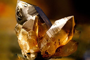Citrine Quartz Crystal Cluster with Golden Facets and Warm Natural Light HD wallpaper