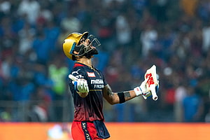 Sunrisers Hyderabad cricketer celebrating a milestone with bat raised in the air HD wallpaper