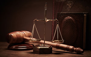 Classic Scales of Justice and Wooden Gavel Arrangement with Legal Books HD wallpaper