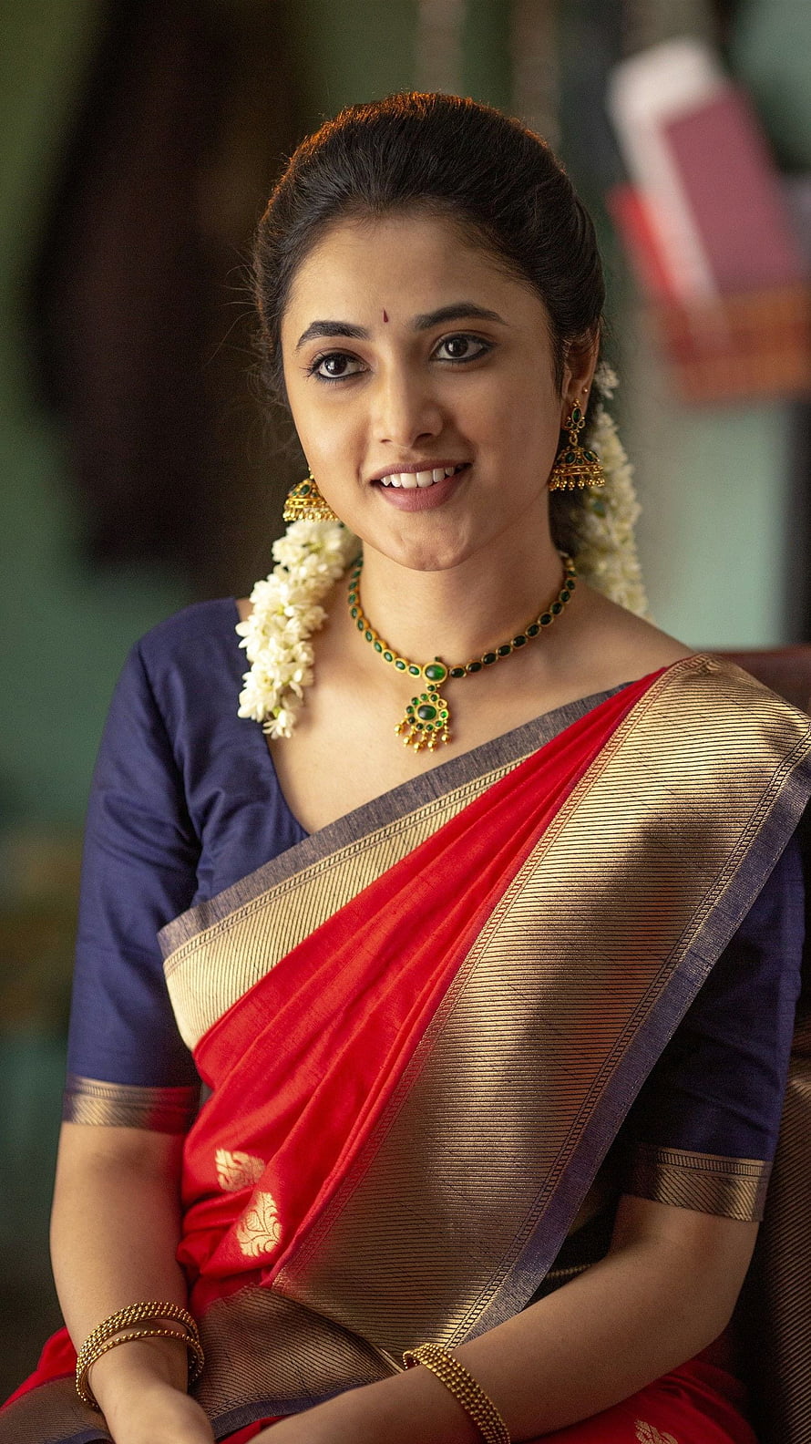 Radhika Pandit in a red and gold silk saree with traditional jewelry HD phone wallpaper