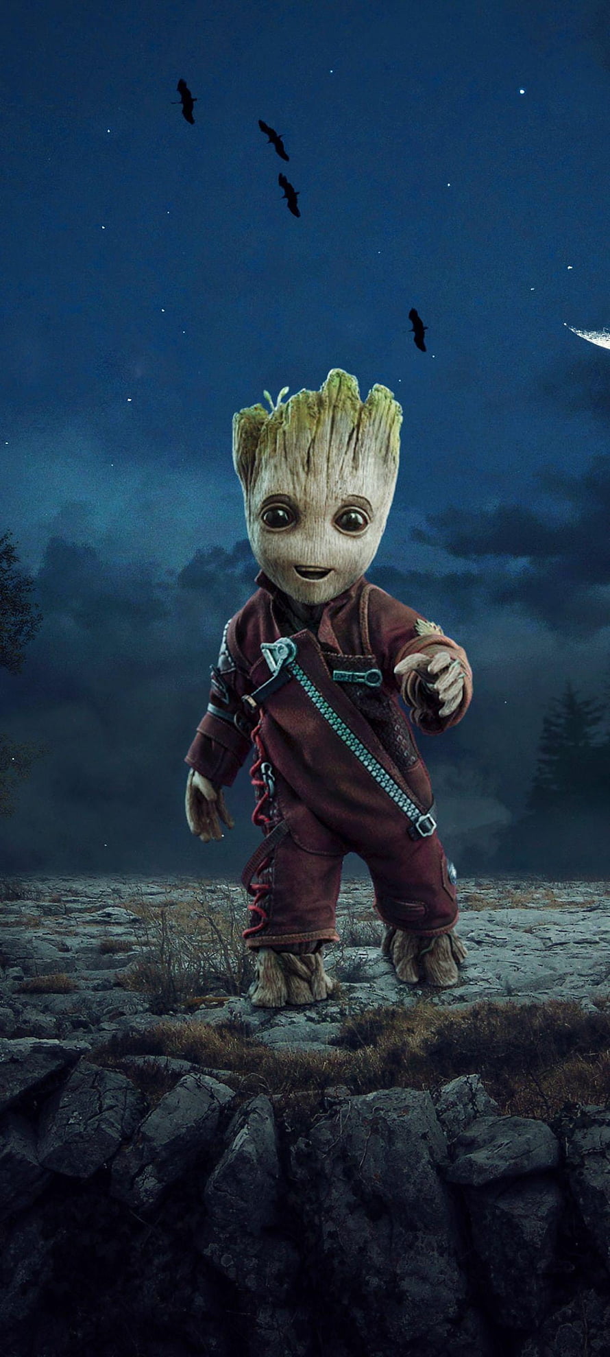 Baby Groot from Guardians of the Galaxy standing on rocky terrain at night HD phone wallpaper