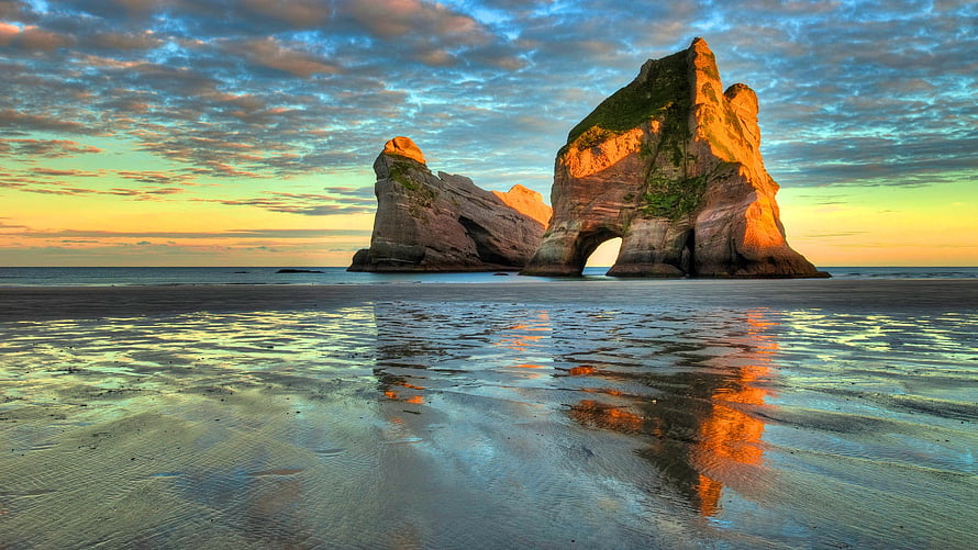 Wharariki Beach New Zealand Sunset Rock Formations HD wallpaper