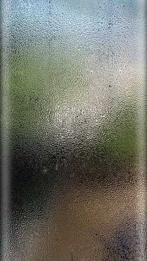 Condensation on a Window Pane with Blurred Green Background HD phone wallpaper