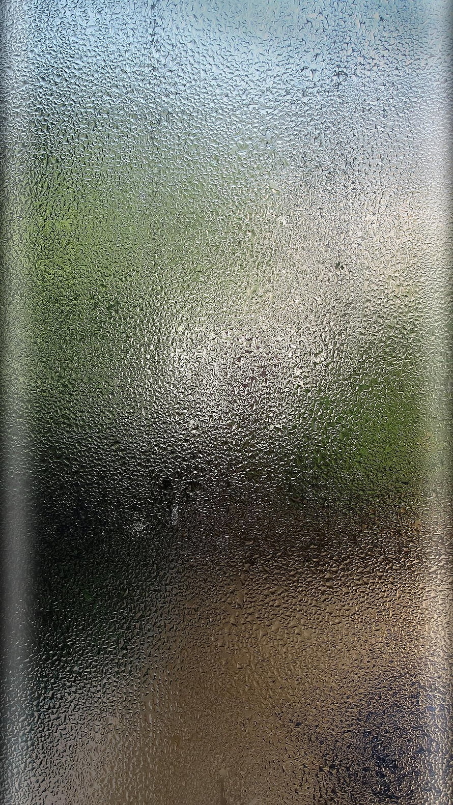 Condensation on a Window Pane with Blurred Green Background HD phone wallpaper