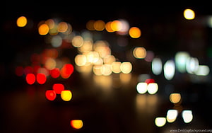Abstract Night City Bokeh with Warm and Cool Light Orbs on Dark Background HD wallpaper