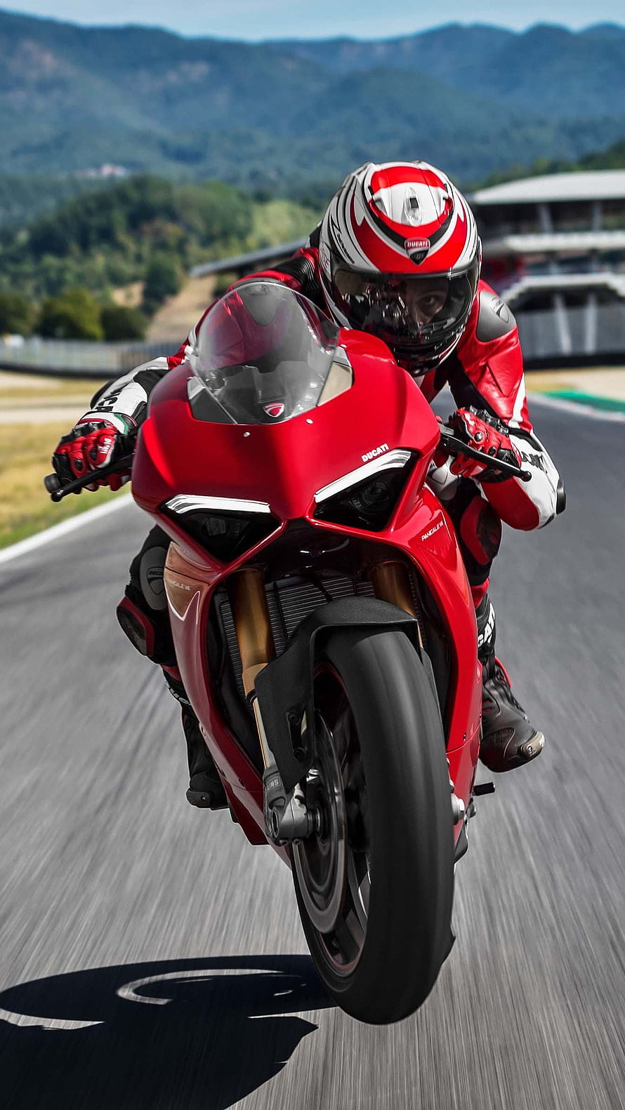 Ducati Panigale V4 Superbike Rider Cornering on a Mountain Race Track HD phone wallpaper