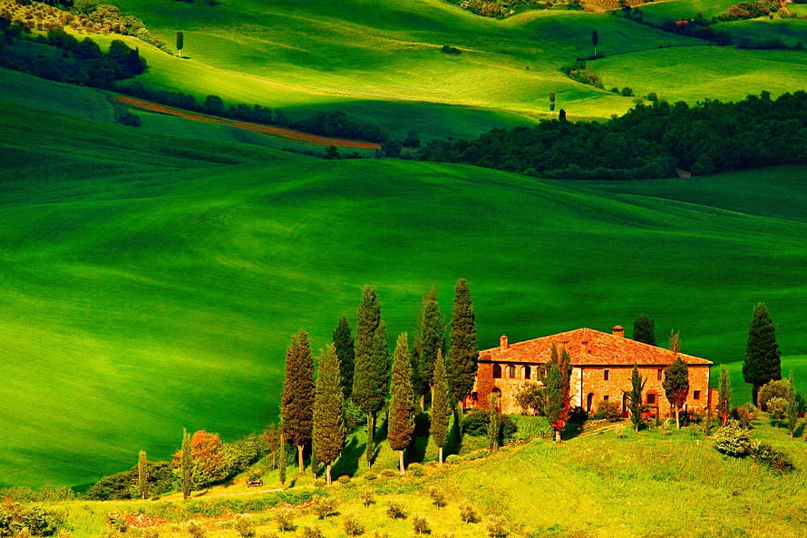 Tuscan countryside villa with cypress trees on rolling green hills in Italy HD wallpaper