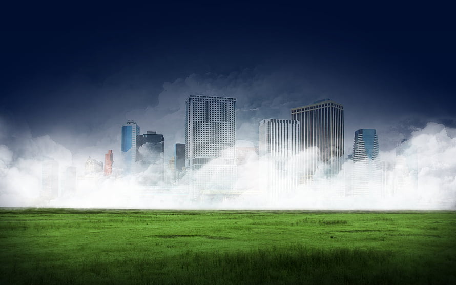 Surreal Cityscape Emerging from Mist Over a Lush Green Meadow Under a Dark Stormy Sky HD wallpaper