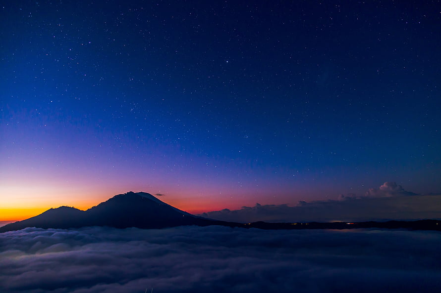 Starry Night Sky Over Mountain Peak Above Sea of Clouds at Twilight HD wallpaper
