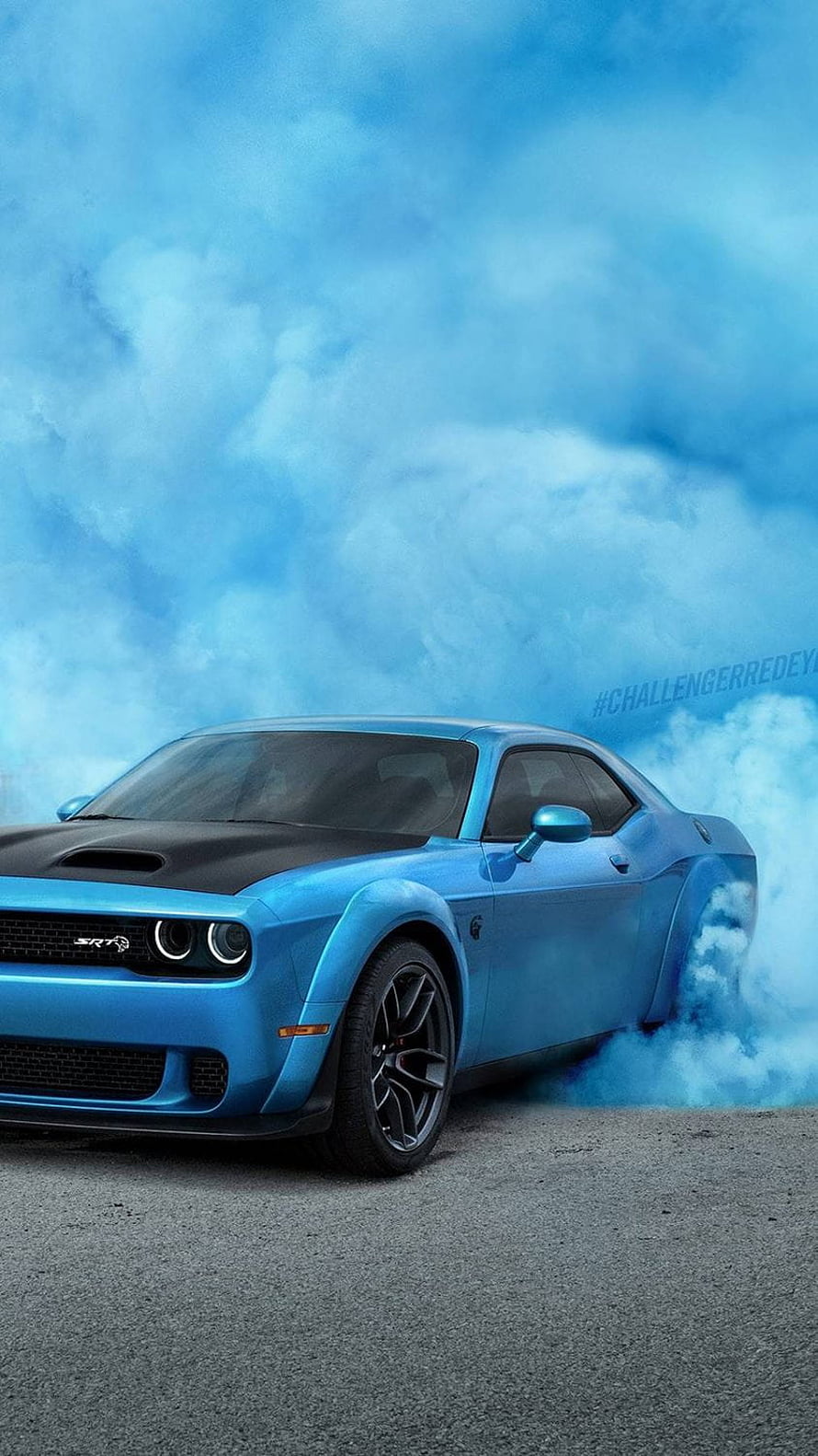 Blue Dodge Challenger SRT Hellcat drifting with smoke on asphalt HD phone wallpaper