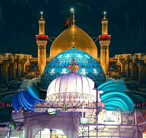 Imam Reza Shrine at Night with Golden Dome and Blue Tiled Architecture HD wallpaper