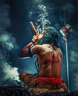 Lord Shiva Playing Flute With Trishul And Damru In Dark Atmosphere HD phone wallpaper