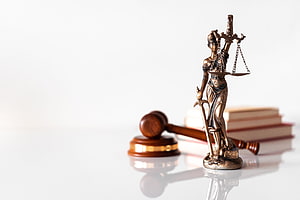 Lady Justice Statue with Gavel and Law Books on White Background HD wallpaper
