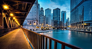 Chicago Riverwalk at Dusk with Skyscrapers and Bridge Illumination HD wallpaper