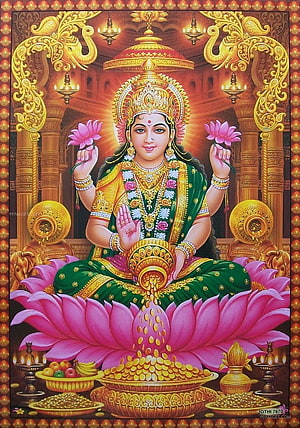 Goddess Lakshmi Seated on Lotus with Gold Coins and Offerings in Traditional Indian Art HD phone wallpaper