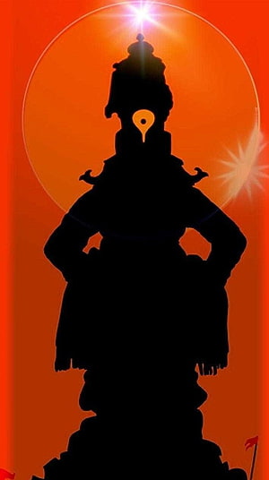 Silhouette of Vitthal Deity Against Vibrant Orange Mandala Background HD phone wallpaper