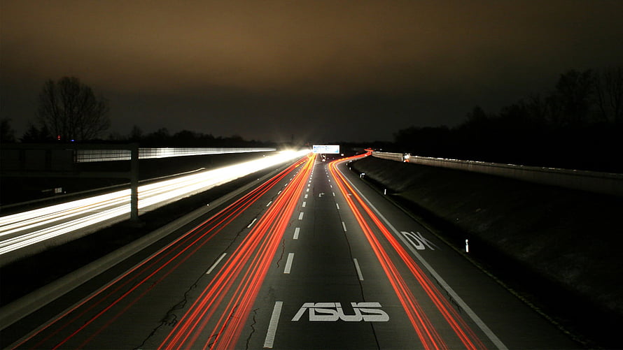 Asus branded highway at night with red and white light trails HD wallpaper