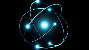 Glowing Blue Atom Structure with Orbiting Electrons on Black Background HD wallpaper