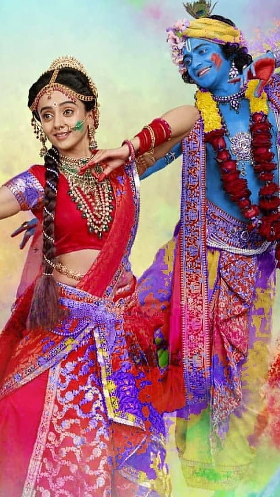 Radha Krishna in Vibrant Holi Festival Attire with Traditional Indian Jewelry HD phone wallpaper