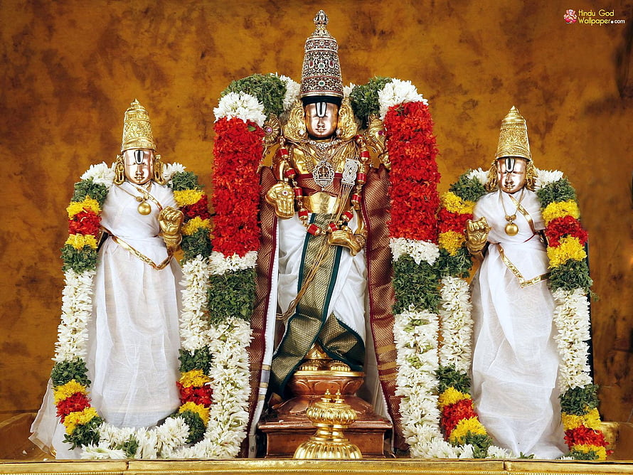 Lord Ayyappa with Sastha and Bhadrakali adorned in flowers and gold jewelry HD wallpaper