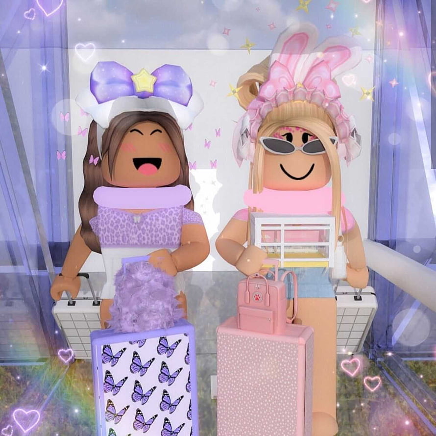 Cute Roblox avatars with pastel butterfly and polka dot luggage in a magical sparkly setting HD wallpaper