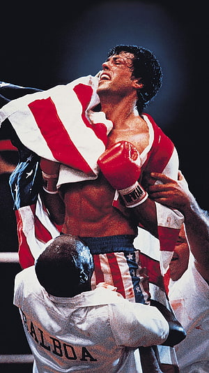 Rocky Balboa Draped in American Flag After Victory in the Boxing Ring HD phone wallpaper