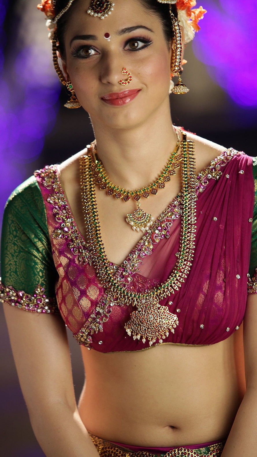 Tamanna Bhatia in Traditional Indian Attire with Elaborate Gold Jewelry and Floral Headpiece HD phone wallpaper