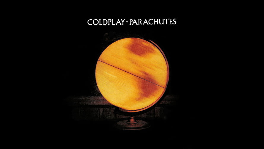 Coldplay Parachutes Album Artwork Featuring Glowing Orange Globe on Dark Background HD wallpaper