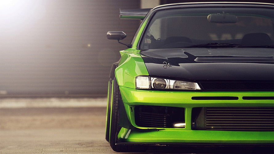 Vibrant Green and Black Widebody Sports Car Front End Close-Up HD wallpaper