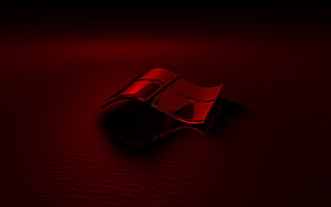 Glossy Red Windows Logo Emblem on Dark Reflective Surface HD wallpaper