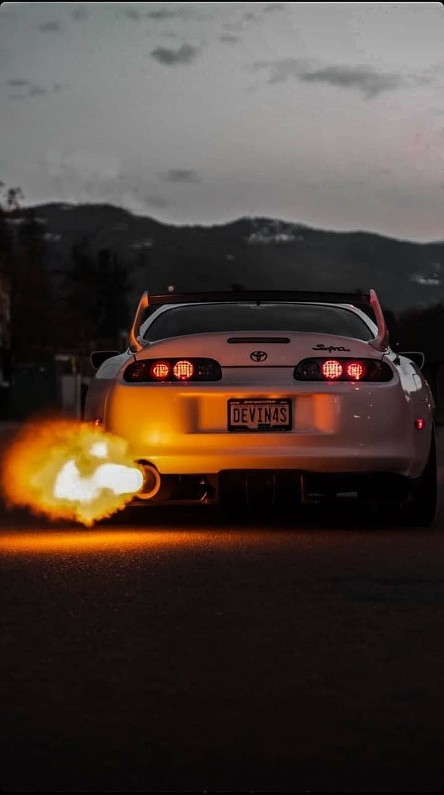 White Toyota Supra Shooting Flames From Exhaust At Dusk HD phone wallpaper